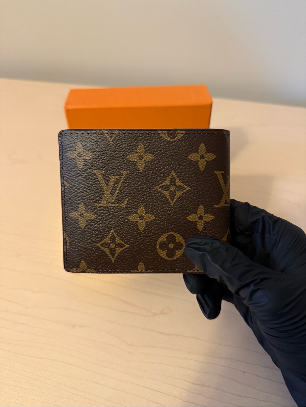 Louis Vuitton Brown Monogram Canvas Wallet with Gold Accents